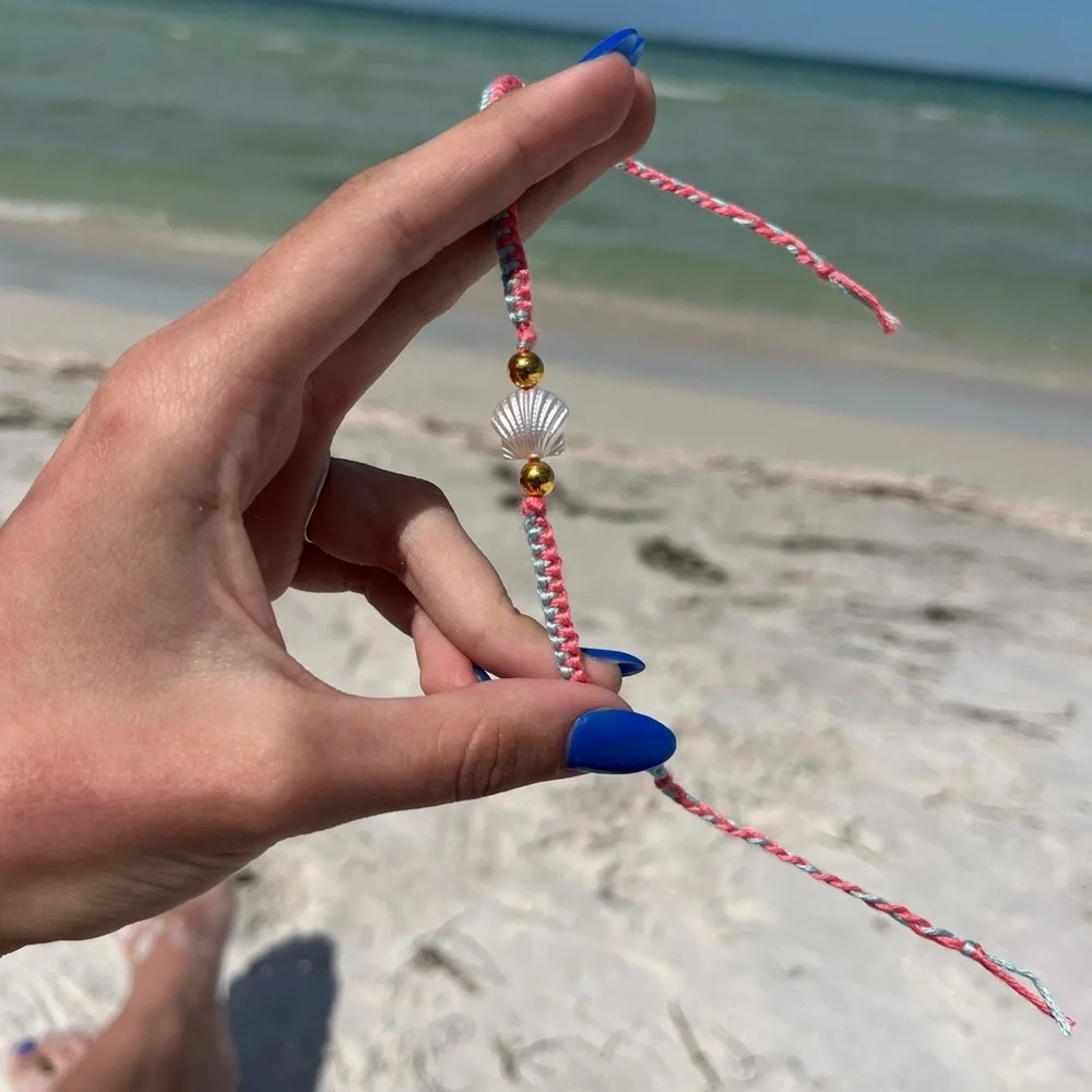 Handmade woven pink and blue zipper bracelet with pearl shell bead